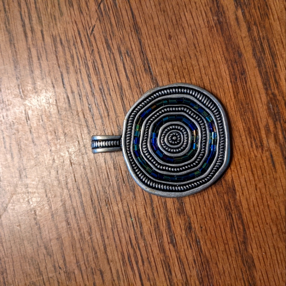 Premier Designs reversible pendant.